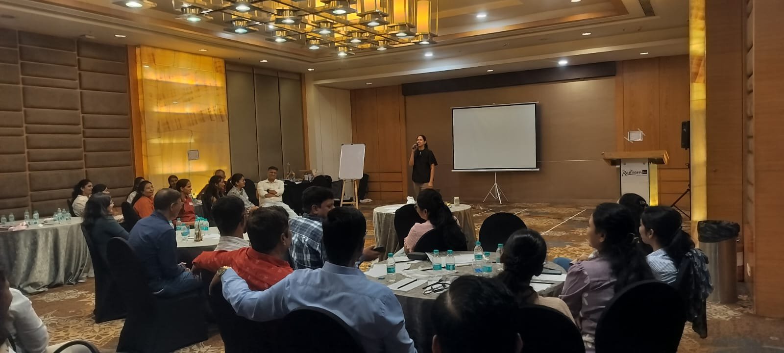 Corporate workshop participants celebrating with certificates — Manatattva leadership program
